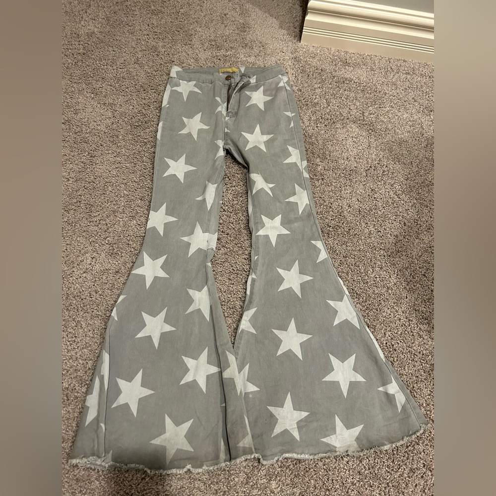 Gray and white star flare jeans size M/L